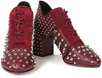 Red(V) Cutout Suede-trimmed Studded Textured-leather Pumps