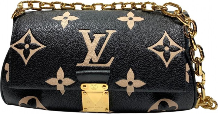 Louis Vuitton Favorite leather handbag - ShopStyle Tote Bags