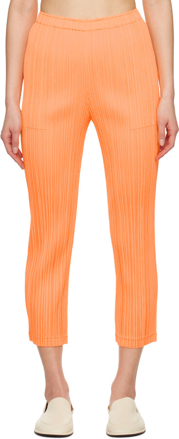 Pleats Please Issey Miyake Women's Orange Pants | ShopStyle