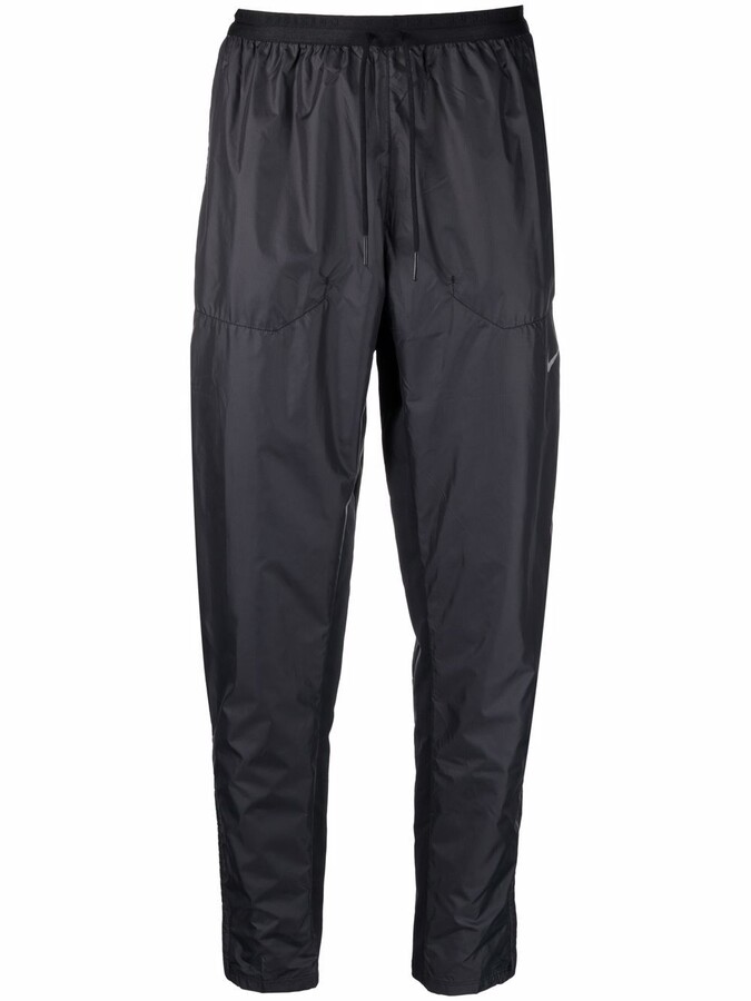 Nike Water-Resistant Jogging-Trousers - ShopStyle Pants