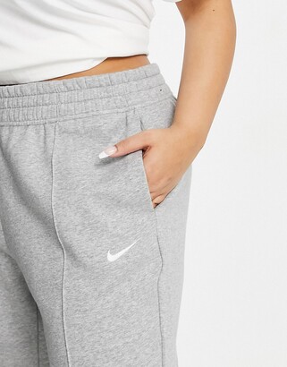 Nike Plus mini swoosh oversized jogger in grey