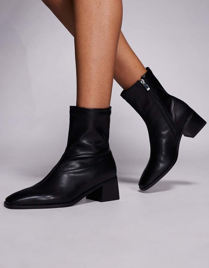 ASRA Harper mid heel monochrome ankle boots in ecru and black