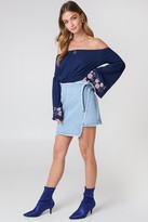 Thumbnail for your product : Debiflue X Na Kd Embroidered Wrap Denim Skirt Light Blue Denim