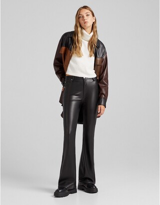 Bershka flare faux leather pants in black - ShopStyle Wide-Leg Trousers