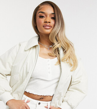 ASOS DESIGN reversible quilted bomber jacket in khaki and cream