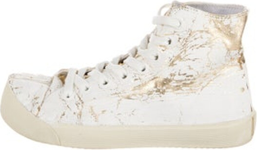 Maison Margiela Leather High Top Sneakers Gold & White Round-Toes Tie Closures Unfortunately, due to restrictions, this item may not be eligible for shipping in all areas.