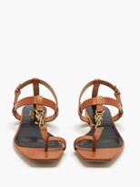 Thumbnail for your product : Saint Laurent Cassandra plaque Leather Sandals - Tan
