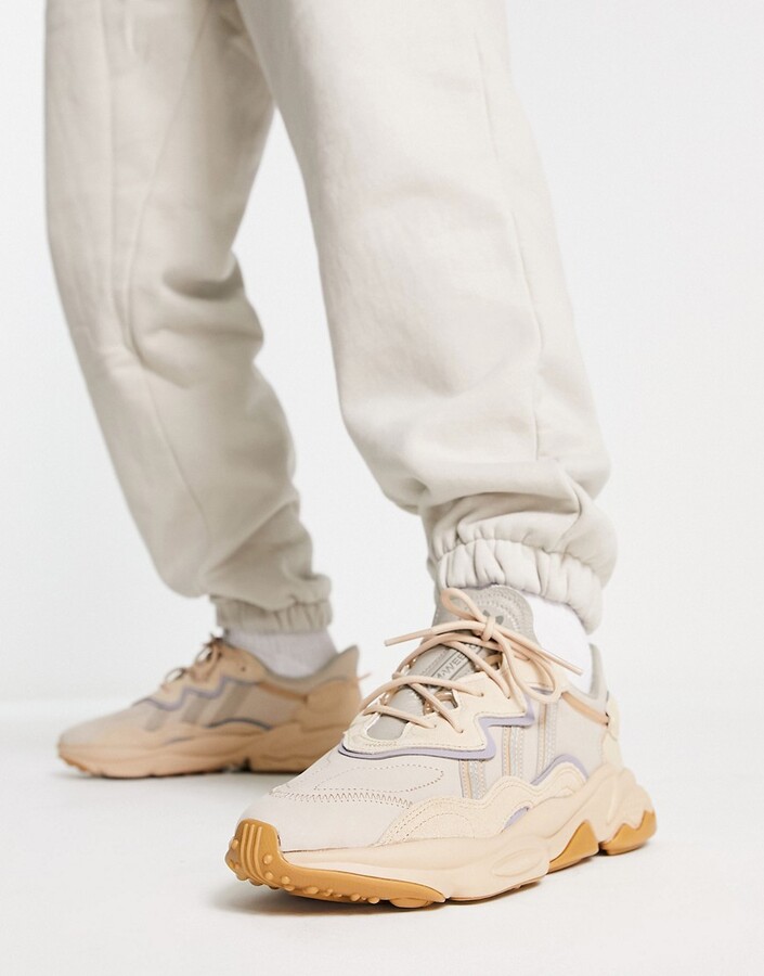 adidas Ozweego trainers in sand - ShopStyle