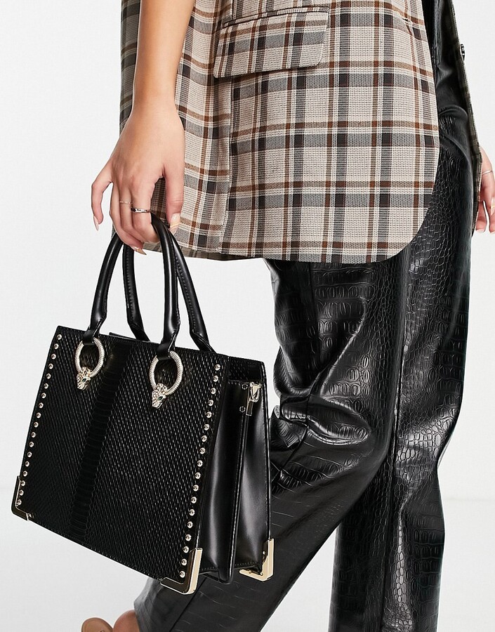 black leather structured handbolsa