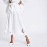 Thumbnail for your product : River Island Womens Petite white crochet hem wide leg trousers