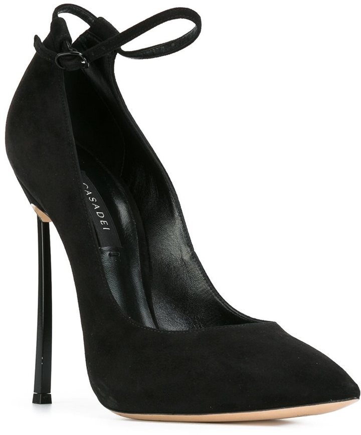 pumps with strap across the foot