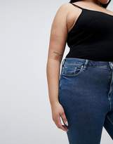Thumbnail for your product : ASOS Curve DESIGN Curve Ridley high waist skinny jeans in dena mid blue wash