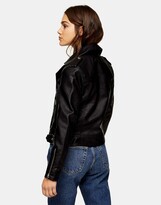 Thumbnail for your product : Topshop Petite faux leather biker jacket in black