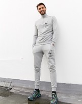Thumbnail for your product : ASOS DESIGN x Dark Future tracksuit with half zip sweatshirt and skinny joggers