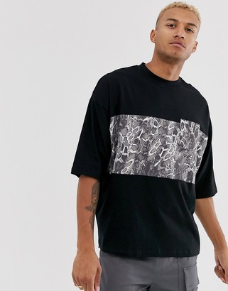 ASOS DESIGN organic cotton oversized t-shirt with animal colour block block and contrast pocket
