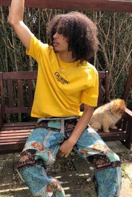 GUESS Originals UO Exclusive LA Logo Solar Power T-Shirt - Yellow XL at Urban Outfitters