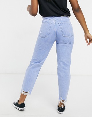 Bershka organic cotton mom jeans with knee rips and distressed hem in light  blue - ShopStyle
