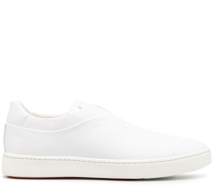white leather slip ons