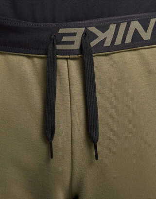 nike running tapered fleece joggers in khaki