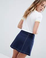 Thumbnail for your product : Monki A-line denim skirt with organic cotton and button detail in indigo