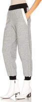 Thumbnail for your product : Givenchy Cropped Jogger Pant in Heather Grey | FWRD