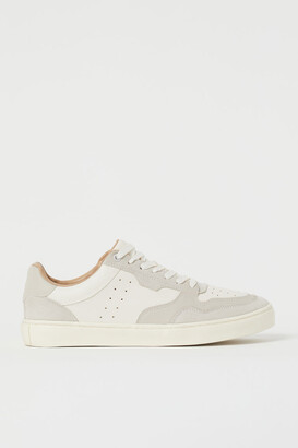 trainers h and m