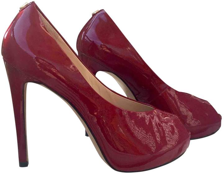 guess red high heels