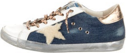 Golden Goose Denim Low Top Sneakers Blue & White Printed Leather, Rubber & Shearling Trim Round-Toes with Distressed Accents Lace-Up Closure at Uppers Includes Additional Embellishments Designer