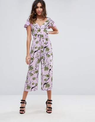 ASOS Design Jumpsuit with Twist back and Frill Detail in Floral Print
