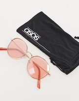 Thumbnail for your product : ASOS DESIGN round sunglasses in gold with light pink lens