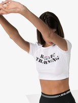 Thumbnail for your product : Adam Selman Sport slogan print cropped T-shirt