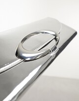 Thumbnail for your product : ASOS DESIGN metallic clutch bag with oval ring detail in silver