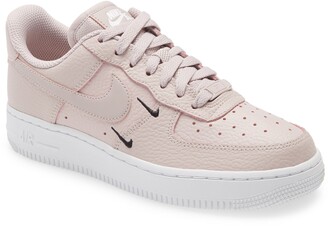 nike shoes with pink swoosh