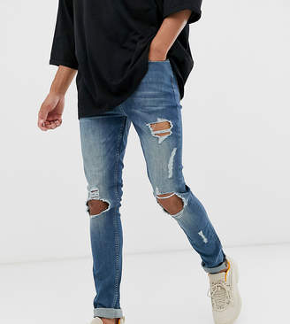 ASOS Design DESIGN Tall super skinny jeans in green cast blue with open rips