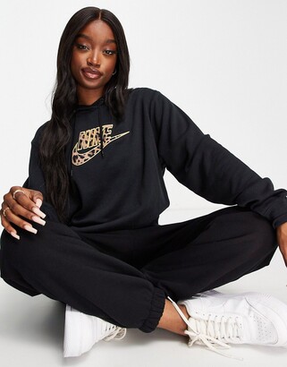 Nike animal print logo fleece hoodie in black - ShopStyle