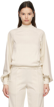cream colored mock turtleneck