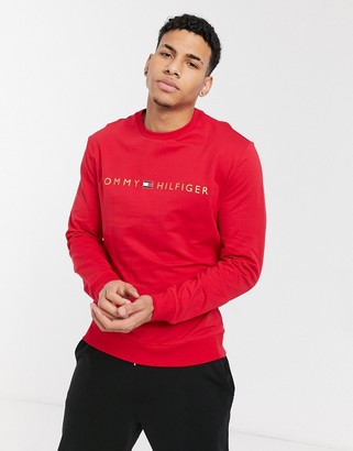 Tommy Hilfiger modern essentials logo long sleeve crew neck in red -  ShopStyle Sweatshirts & Hoodies