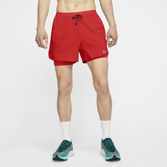 grey and red nike shorts