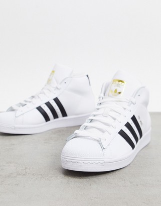 adidas Pro Model Hi top sneakers in white leather - ShopStyle