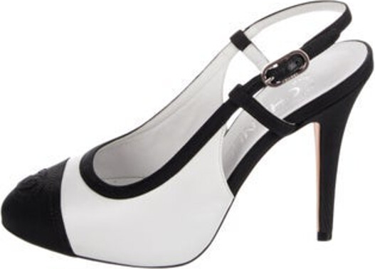 Chanel Leather Slingback Pumps White Interlocking CC Logo Round-Toes with Grosgrain Trim Buckle Closure at Ankles Includes Dust Bag Designer