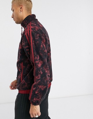 adidas tech fleece jacket with all over print and reflective details tech pack