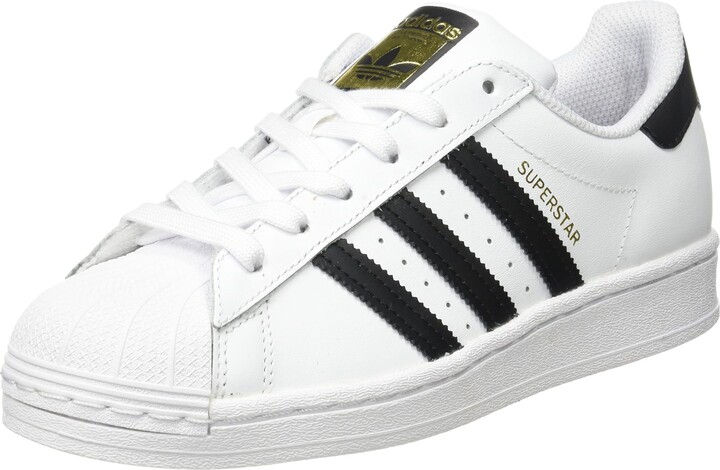black adidas shell toe trainers