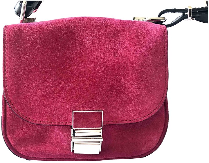 pink suede clutch bag
