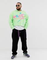 Thumbnail for your product : ASOS Design DESIGN x glaad& Plus cropped sweatshirt with tour print-Yellow