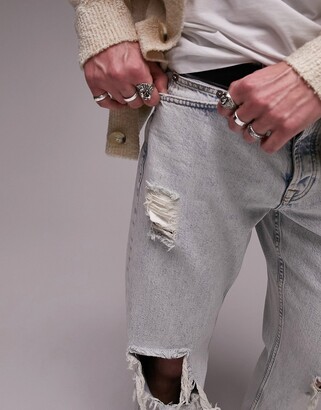 Topman ripped relaxed jeans in bleach acid wash