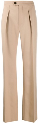 tan flared trousers