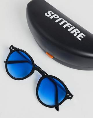 Spitfire round sunglasses in black with blue lens