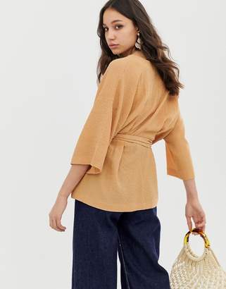 ASOS Tall DESIGN Tall textured oversized top with v neck and tie waist