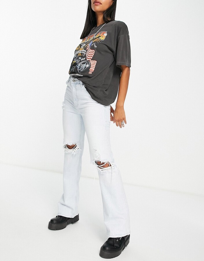 Light Blue Ripped Jeans Shop The World S Largest Collection Of Fashion Shopstyle