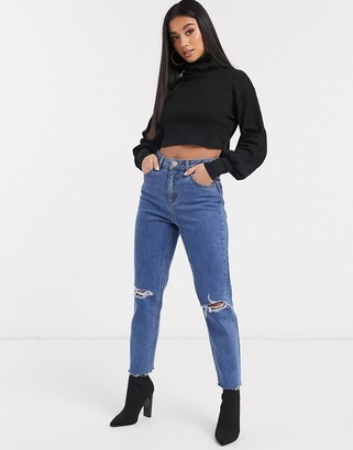 ASOS DESIGN Petite relaxed crop top with slouchy roll neck in soft rib in black
